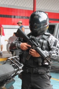 The police Panama style on duty at a grocery store.